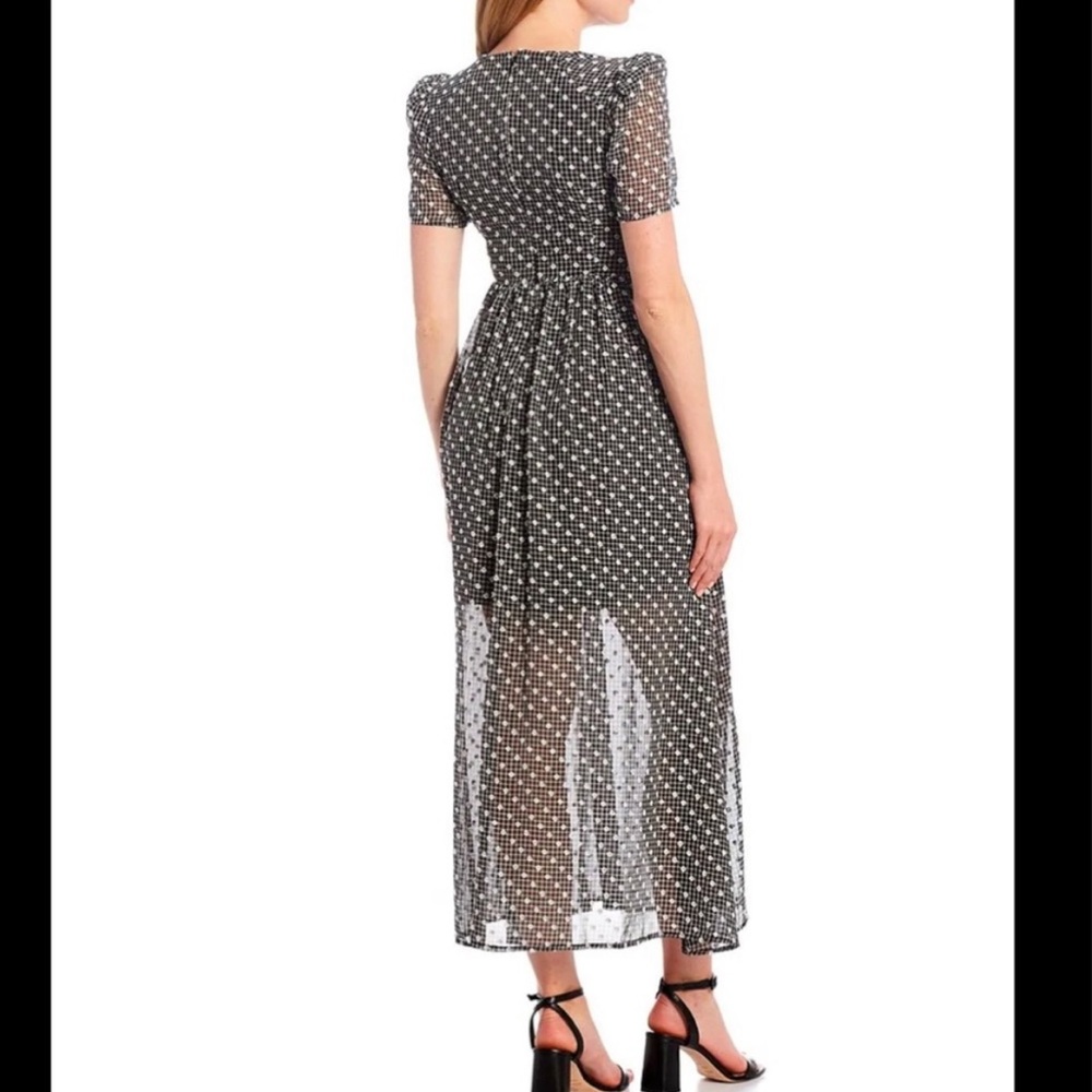 Calvin Klein Dotted V-Neck Short Sleeve Tie Waist
Maxi Dress Black and White - Picture 5 of 7
